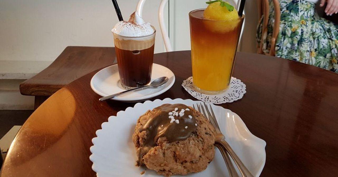 Coffee drinks and dessert setup at a cozy café in Insa-dong, Seoul.